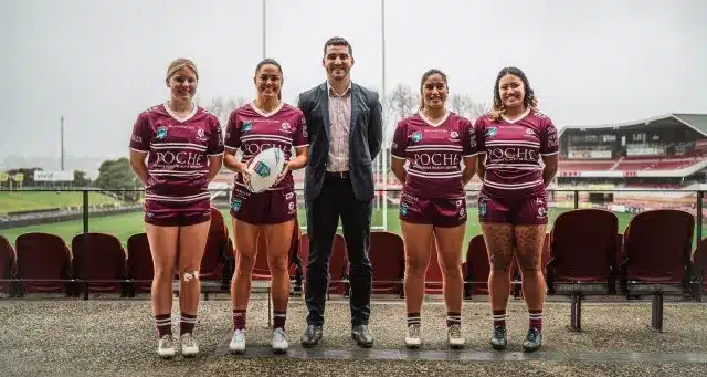 Scott Bear with players from the Sea Eagles new Harvey Norman NSW Womens Premiership team hm